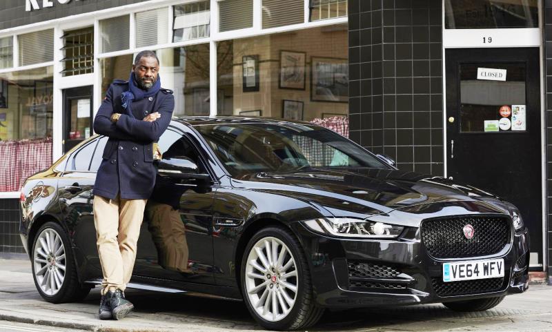 Idris Elba with a Jaguar XE
