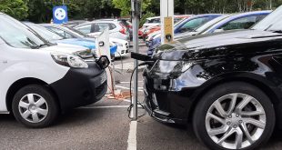 Cars recharging at supermarket - Gareth Herincx