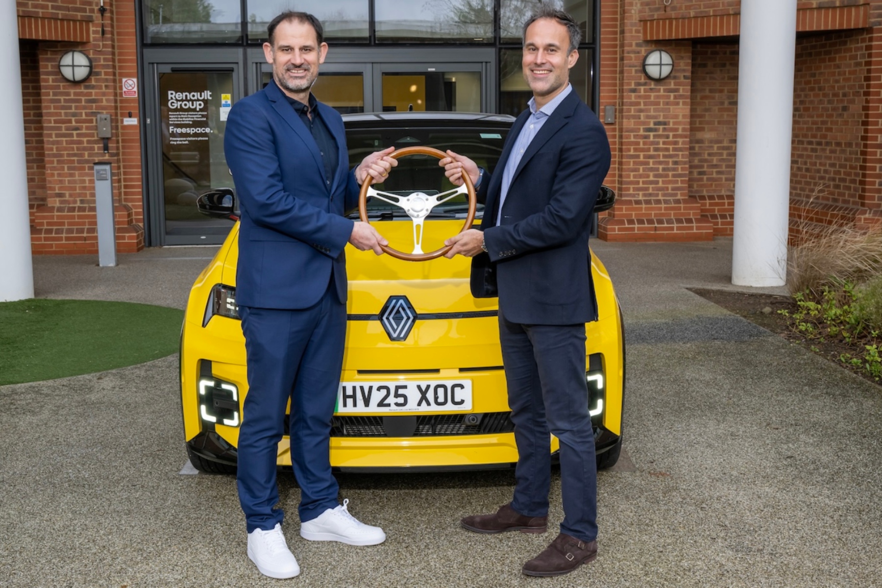 Adam Wood (right), MD, Renault UK, and John Challen, co-chairman of the UK Car of the Year Awards